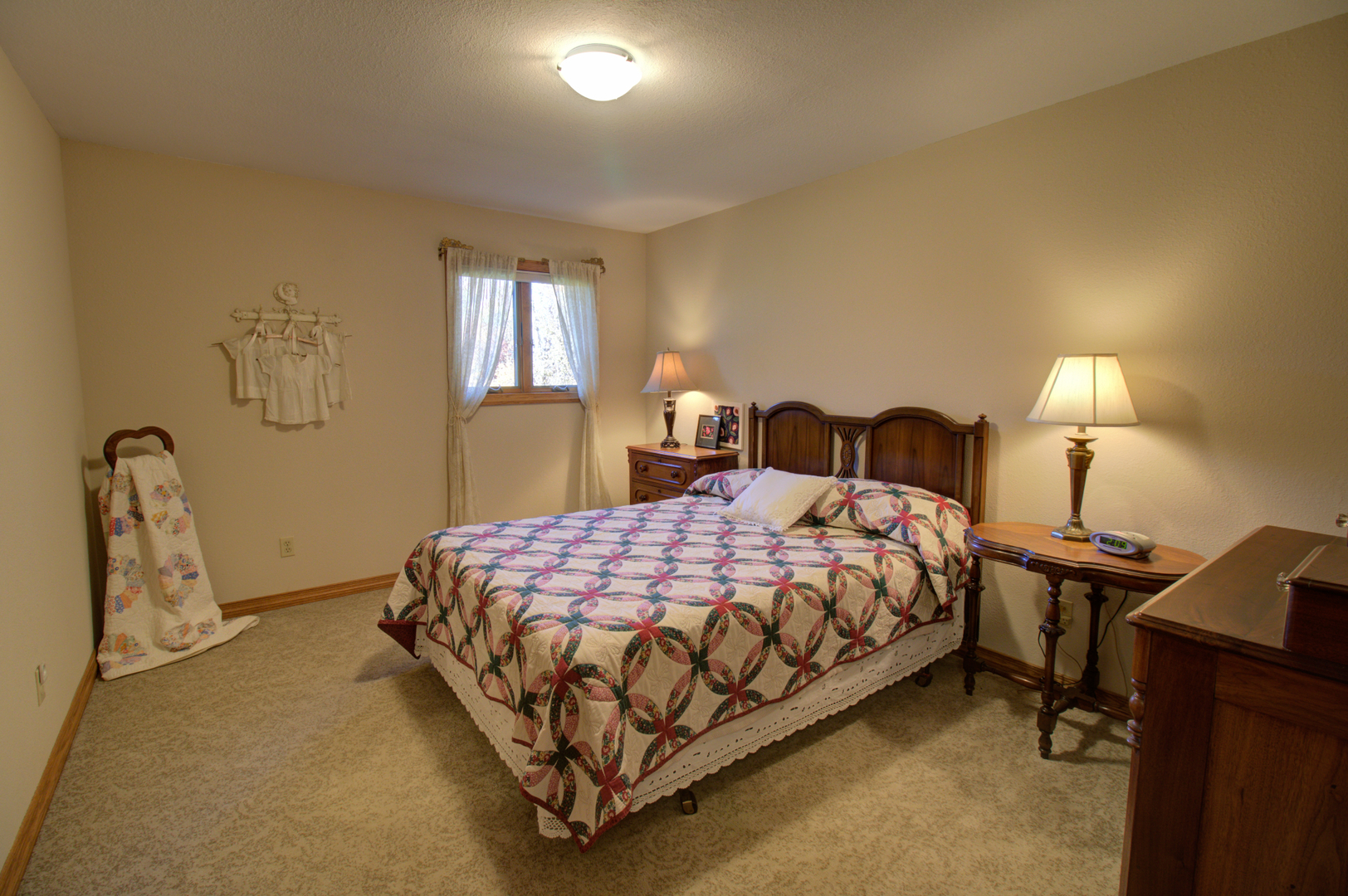 16360 Spring Valley Road Morrison, IL 61270 - Photo 38 of 60 a bedroom with a bed and a lamp with window