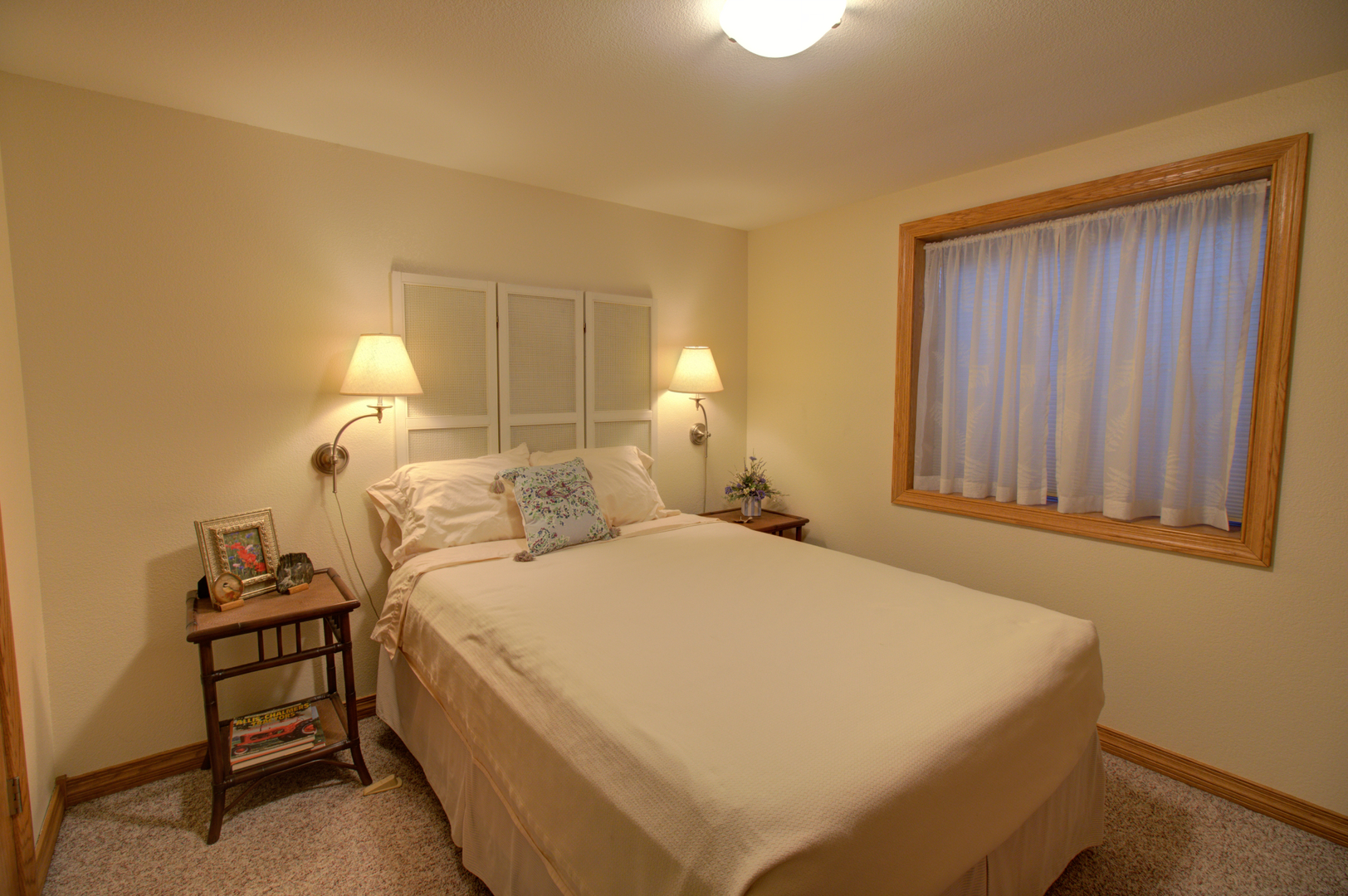 16360 Spring Valley Road Morrison, IL 61270 - Photo 39 of 60 a bedroom with a bed and a night stand