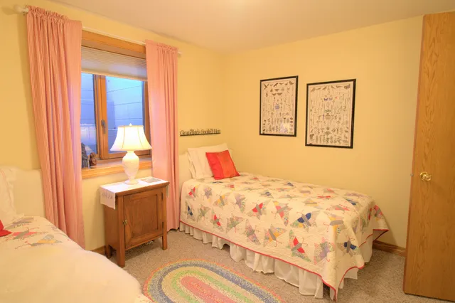 a bathroom with a shower and toilet