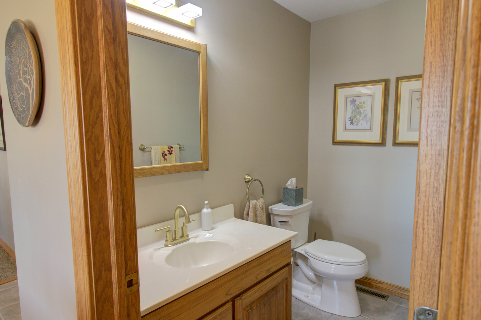16360 Spring Valley Road Morrison, IL 61270 - Photo 42 of 60 a bathroom with a toilet sink and mirror