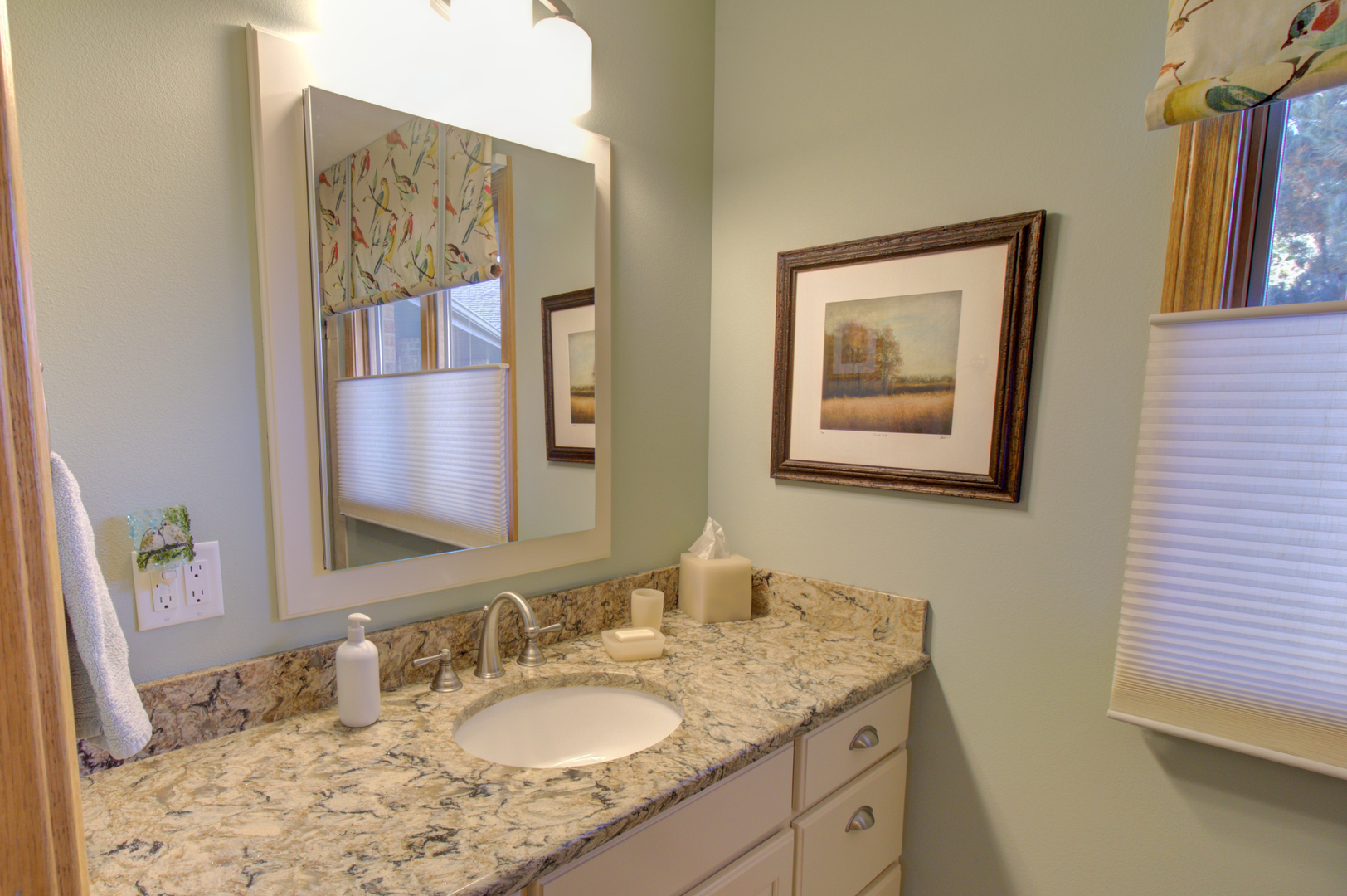 16360 Spring Valley Road Morrison, IL 61270 - Photo 44 of 60 a bathroom with a granite countertop sink and a mirror