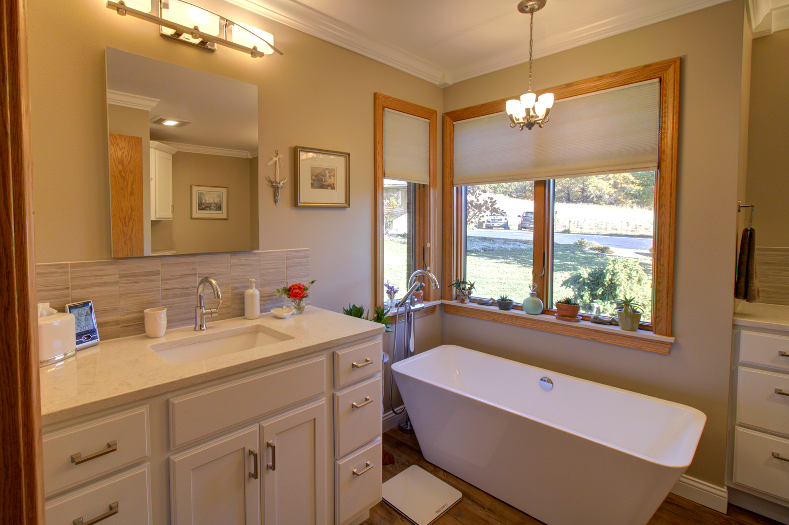 16360 Spring Valley Road Morrison, IL 61270 - Photo 46 of 60 a bathroom with a tub sink and a window