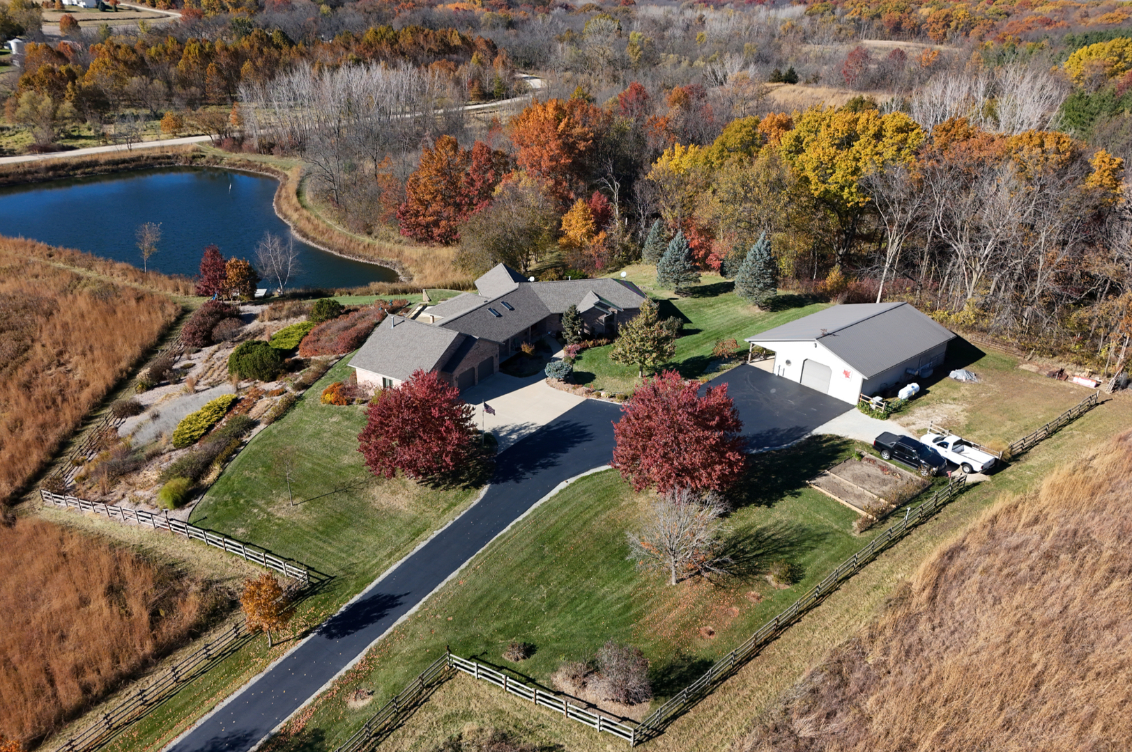 16360 Spring Valley Road Morrison, IL 61270 - Photo 60 of 60 an aerial view of residential houses with outdoor space