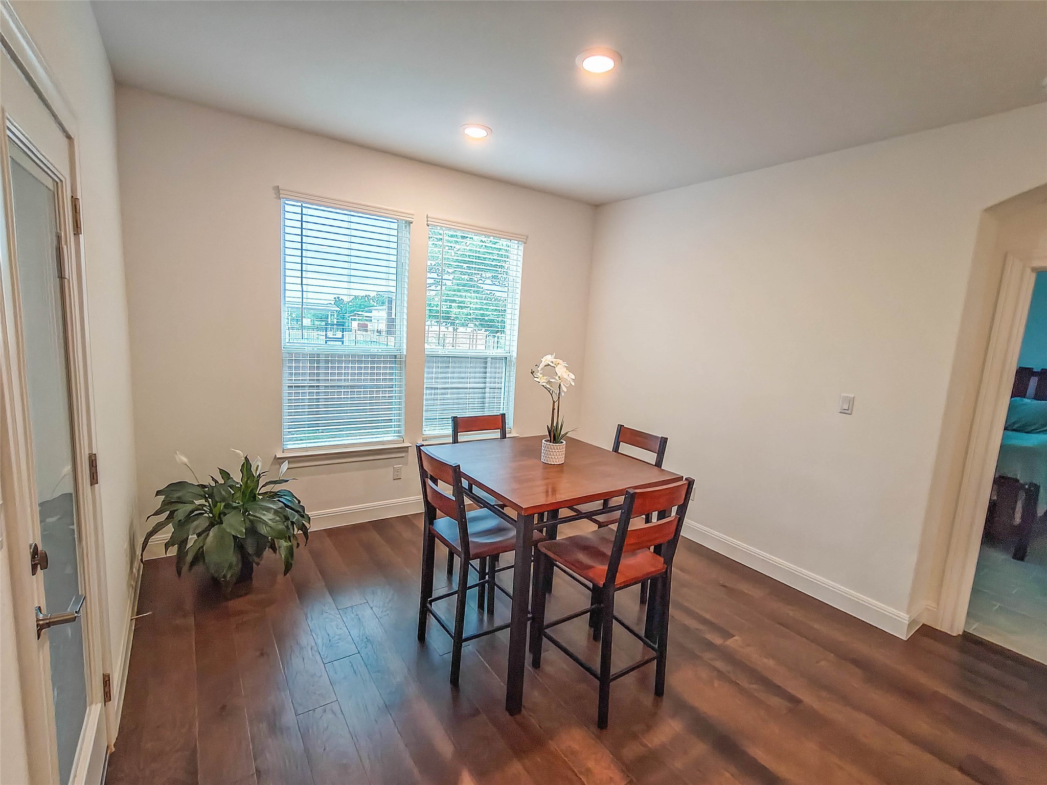 200 Fiddleneck Road Marble Falls, TX 78654 - Photo 11 of 37 a view of a dining room with furniture window and wooden floor
