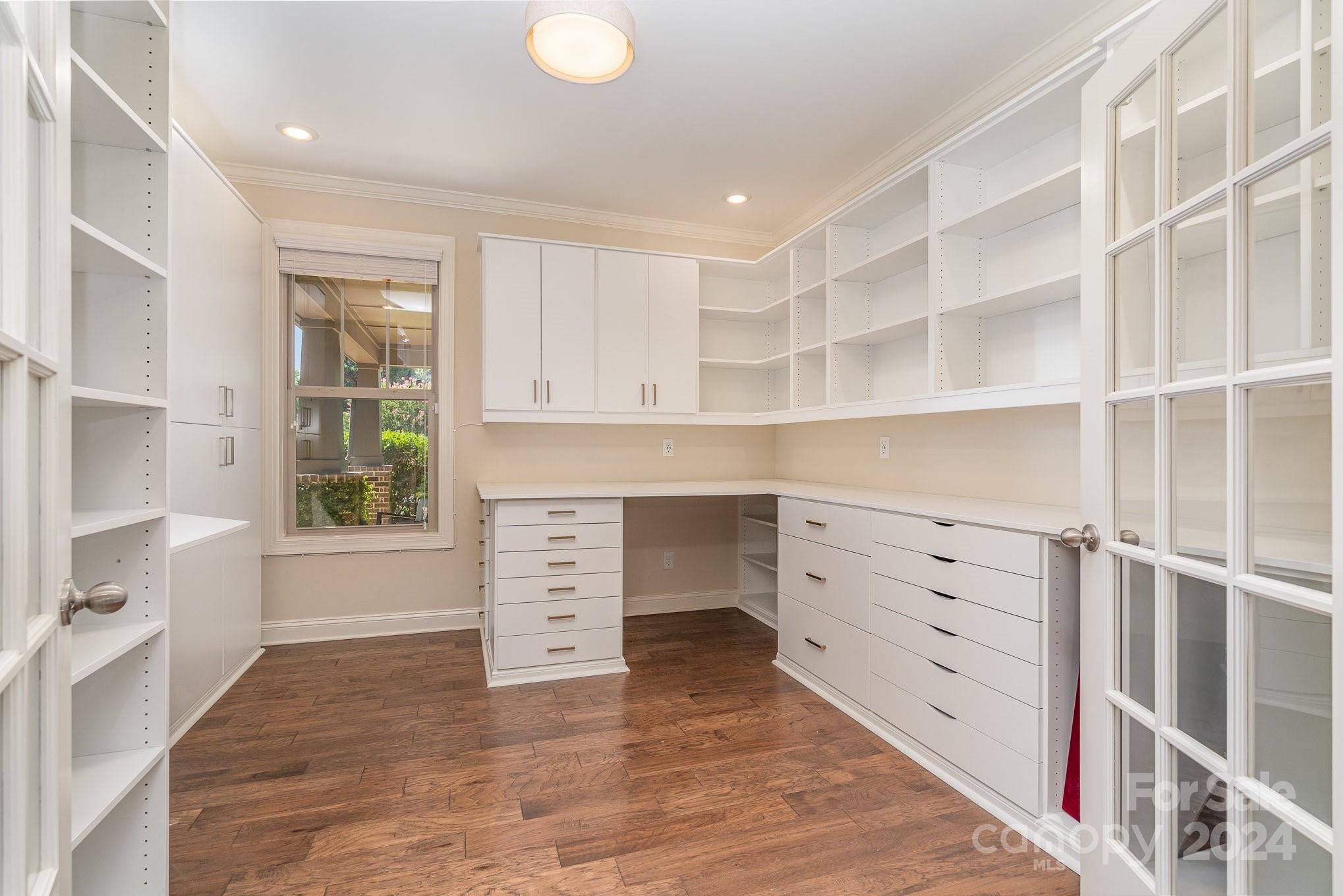 104 Smithfield Drive Charlotte, NC 28270 - Photo 12 of 39 a room with cabinets and window