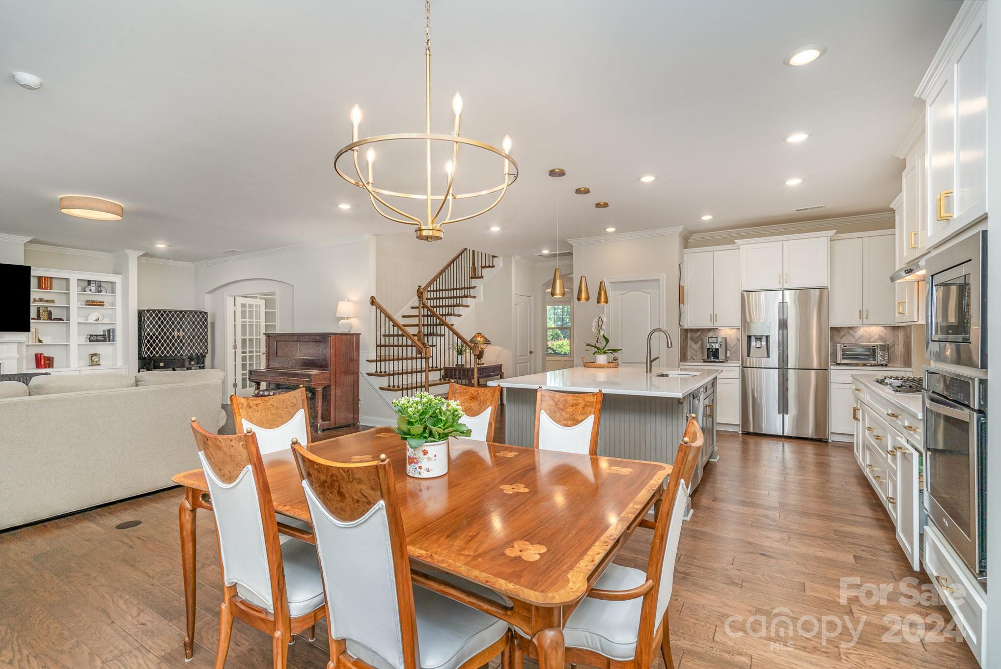 104 Smithfield Drive Charlotte, NC 28270 - Photo 15 of 39 a view of a dining room with furniture