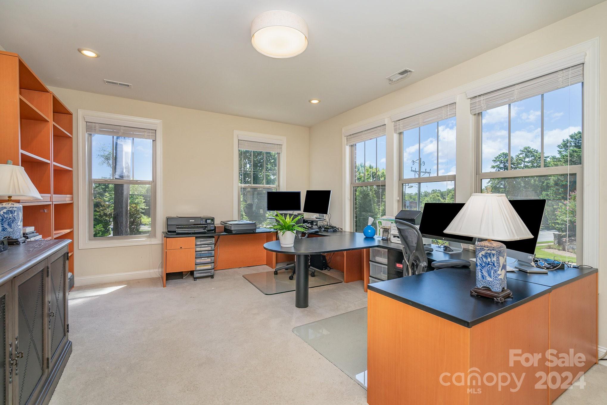 104 Smithfield Drive Charlotte, NC 28270 - Photo 19 of 39 a living room with furniture and a flat screen tv