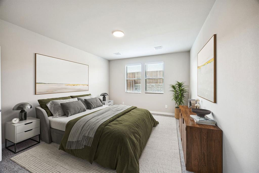 144 Millwood Road Lavon, TX 75166 - Photo 18 of 37 a bedroom with a bed and a couch