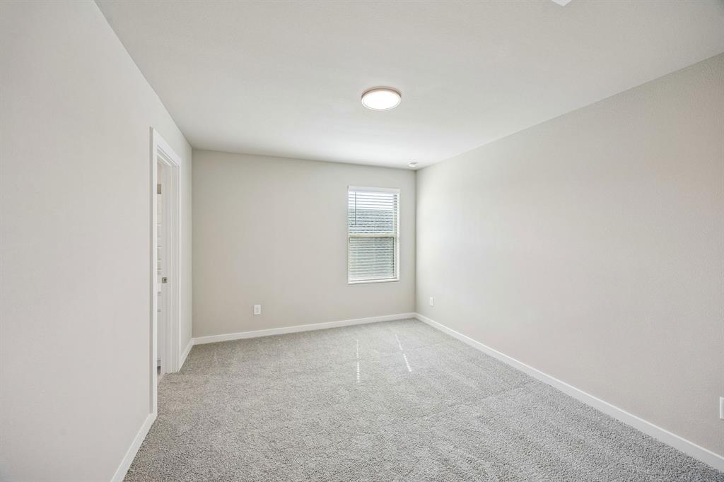 144 Millwood Road Lavon, TX 75166 - Photo 20 of 37 a view of an empty room with a window