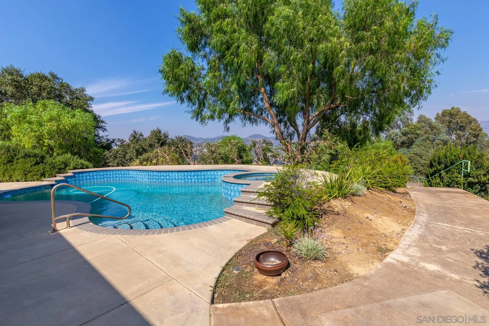 3880 Dos Ninos Road Fallbrook, CA 92028 - Photo 12 of 39 a view of swimming pool in a yard