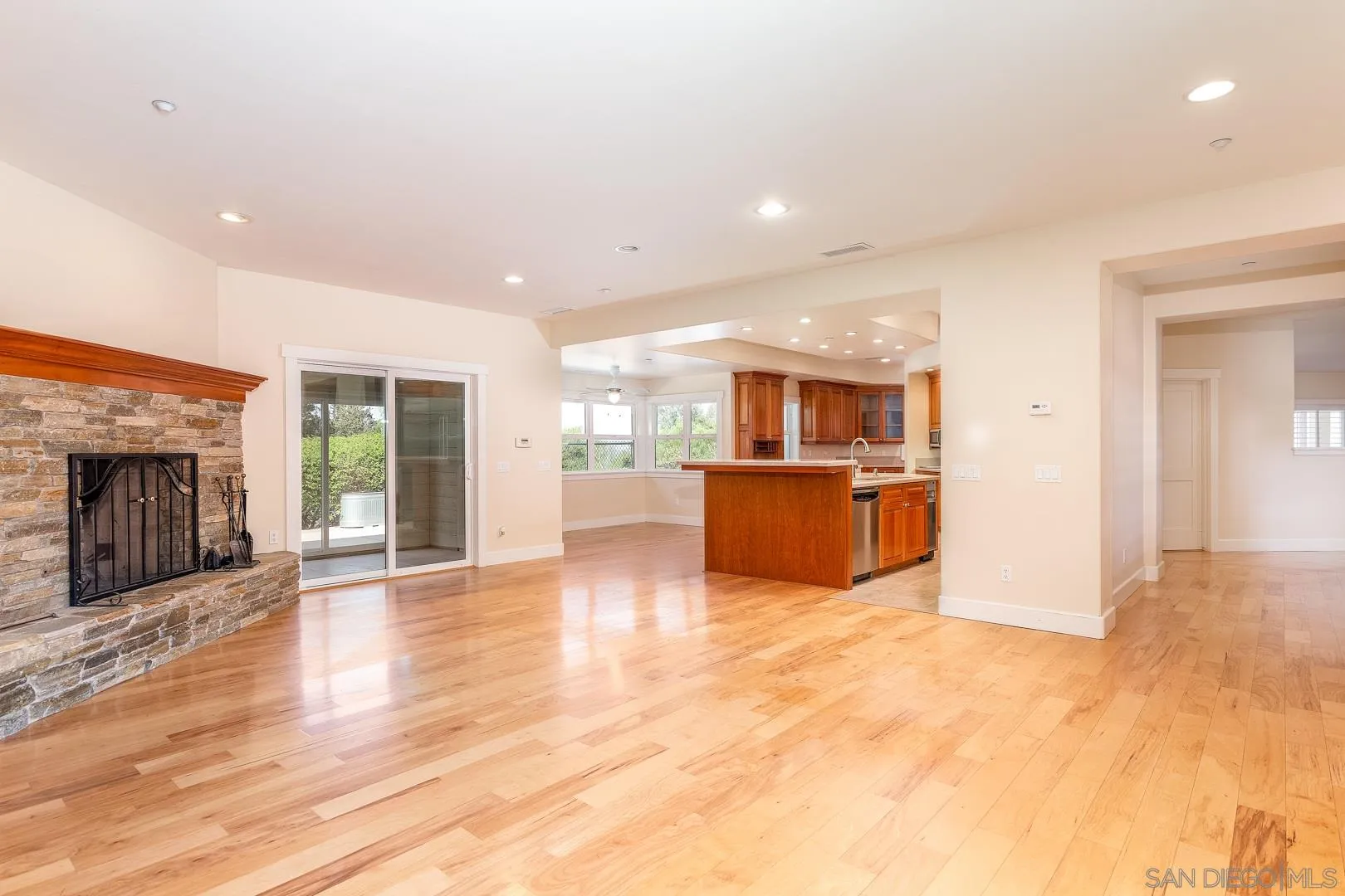 3880 Dos Ninos Road Fallbrook, CA 92028 - Photo 18 of 39 a view of kitchen with furniture and wooden floor