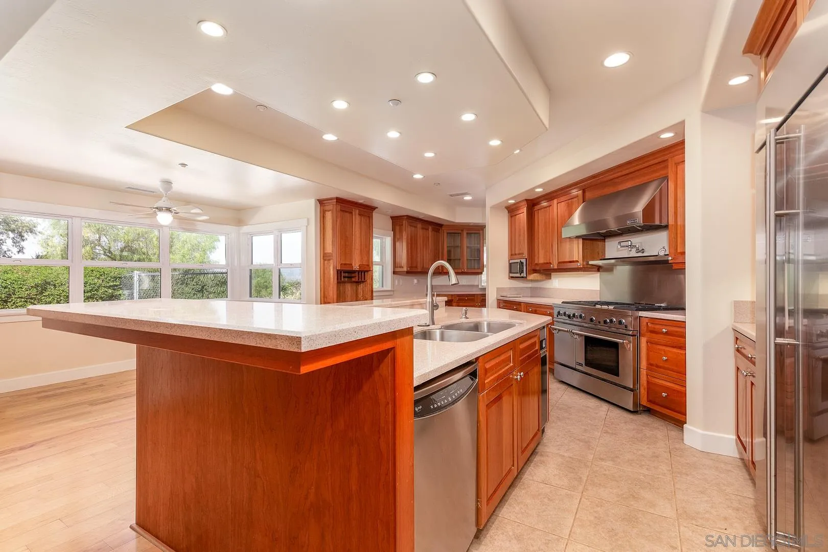 3880 Dos Ninos Road Fallbrook, CA 92028 - Photo 20 of 39 a kitchen with stainless steel appliances granite countertop a stove and a sink