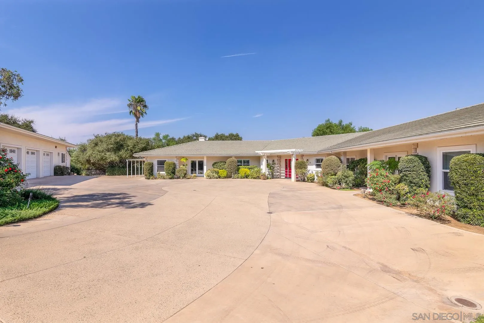 3880 Dos Ninos Road Fallbrook, CA 92028 - Photo 2 of 39 a front view of a house with a yard