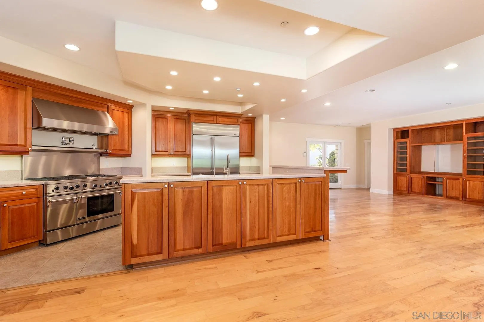 3880 Dos Ninos Road Fallbrook, CA 92028 - Photo 22 of 39 a kitchen with stainless steel appliances granite countertop a stove a sink and a refrigerator