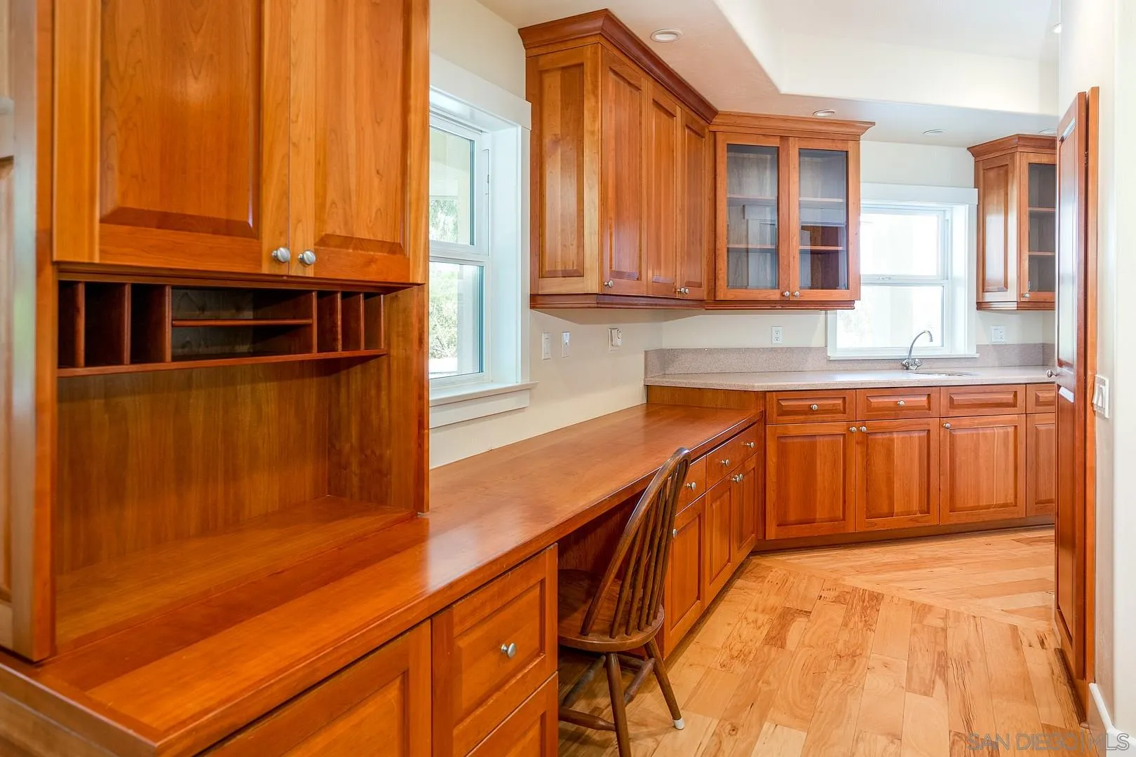 3880 Dos Ninos Road Fallbrook, CA 92028 - Photo 24 of 39 a view of a kitchen with a sink and cabinets