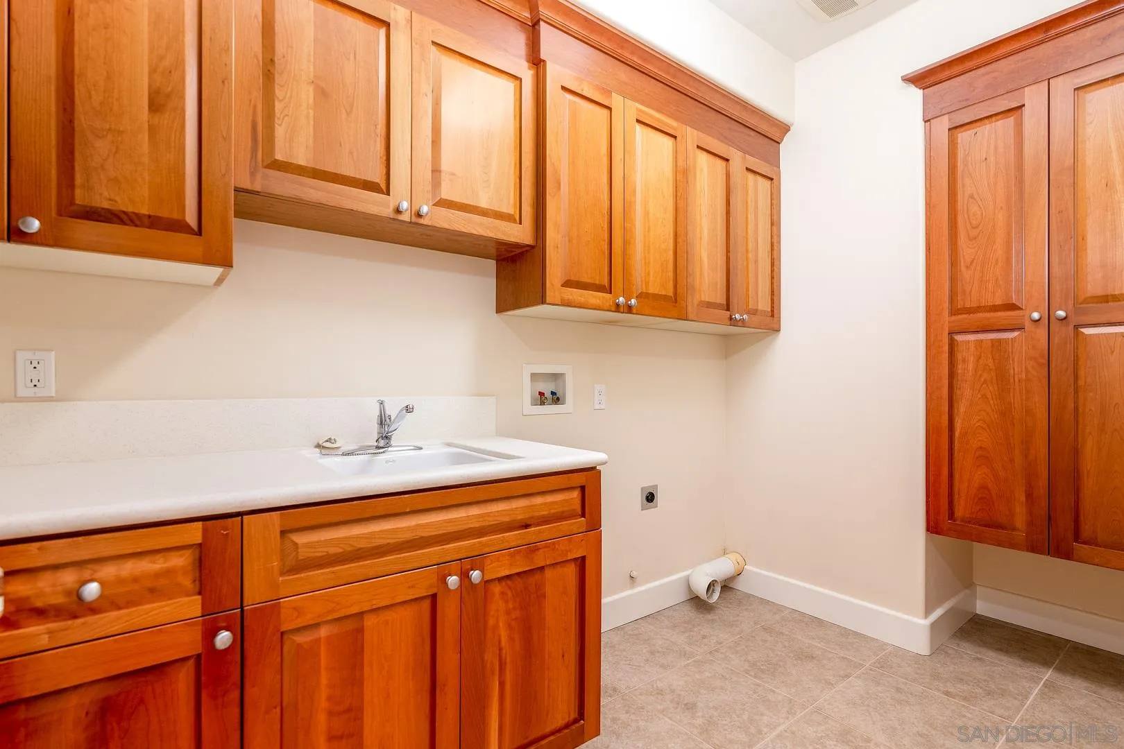 3880 Dos Ninos Road Fallbrook, CA 92028 - Photo 29 of 39 a bathroom with a sink a vanity and a window