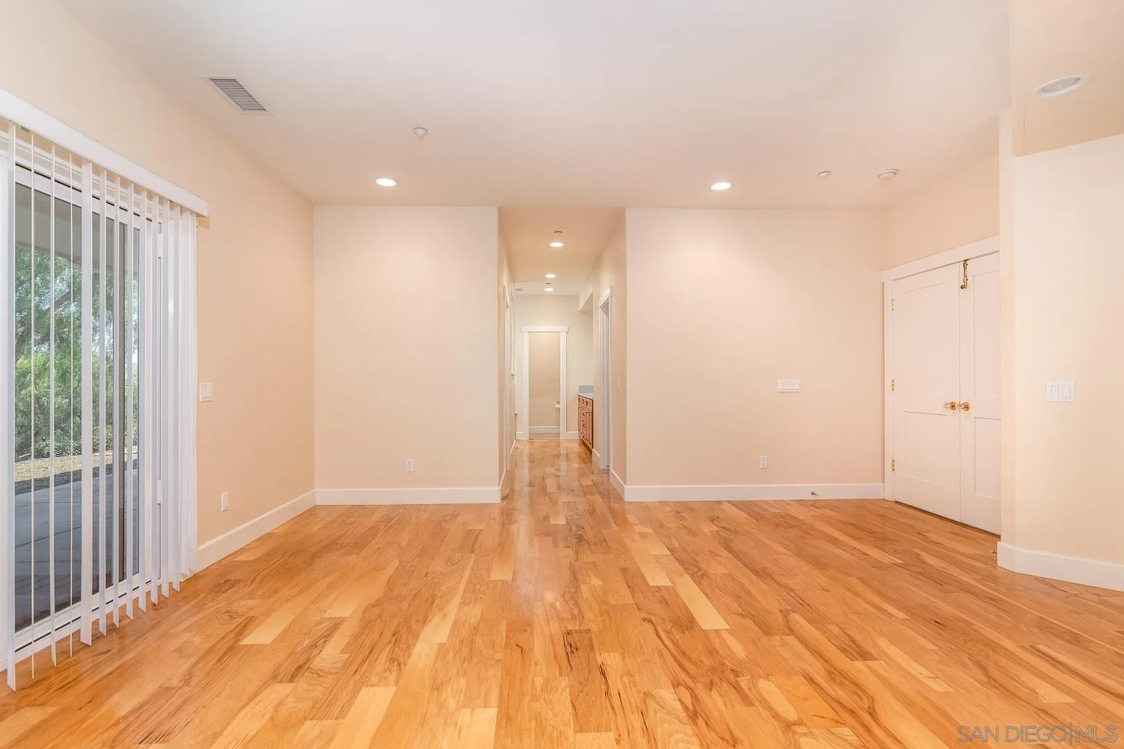 3880 Dos Ninos Road Fallbrook, CA 92028 - Photo 33 of 39 a view of empty room with wooden floor and fan