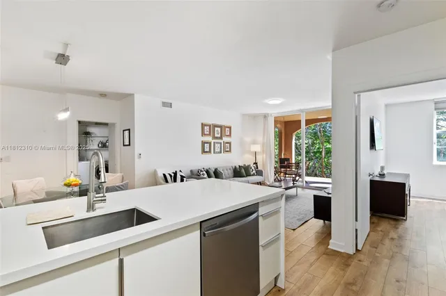 a bedroom with a bed and a desk