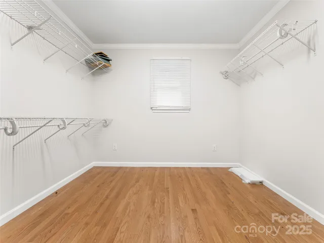 a bathroom with a granite countertop sink toilet a mirror and shower