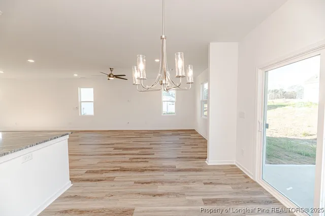 a view of a kitchen and window