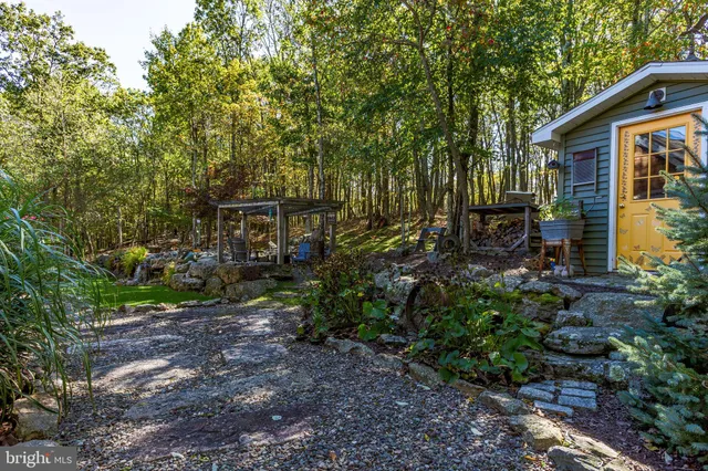 a kitchen with sink a refrigerator and window