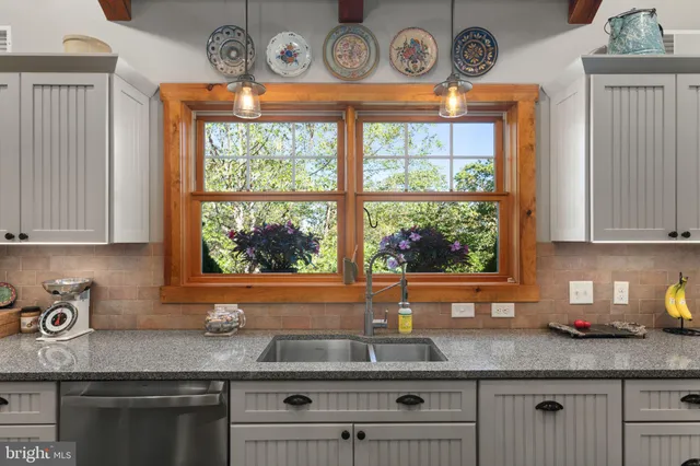a view of a storage & utility room with washer and dryer