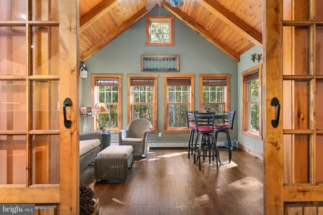a living room with couch and a view of living room