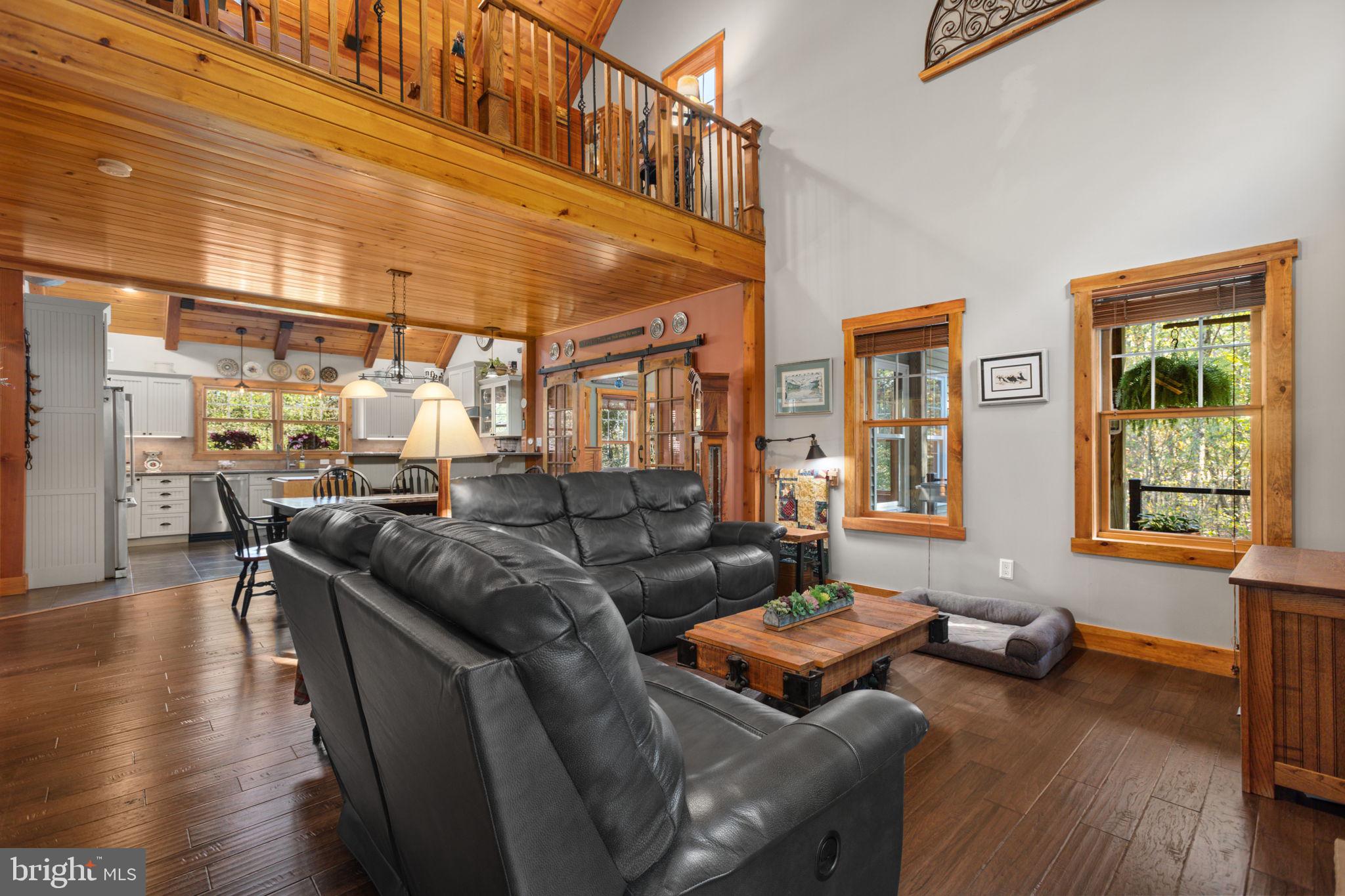 248 Country Club Drive Hazleton, PA 18202 - Photo 35 of 91 a living room with furniture and wooden floor