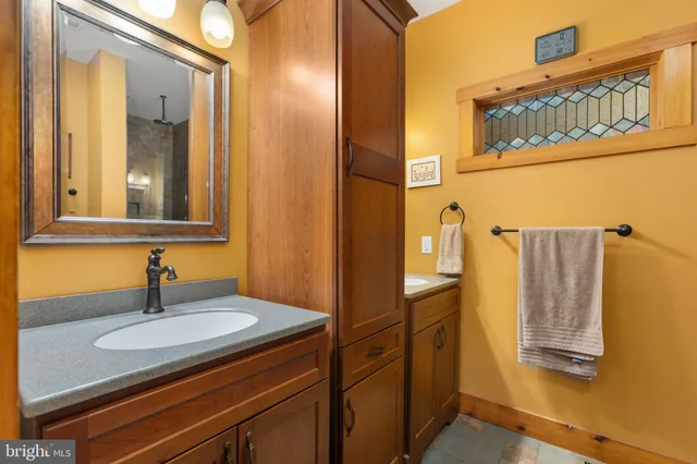 a view of a swimming pool with chairs