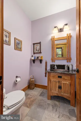 a view of chairs and table in a terrace
