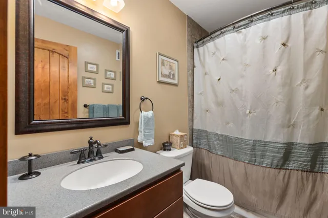 a view of a living room and dining room