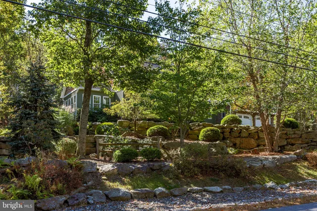 an outdoor space with furniture and umbrella