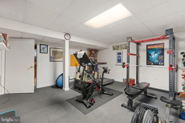 a view of yard with swimming pool and trees