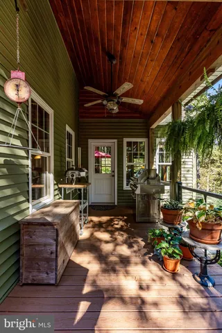 a view of a chairs and table in a patio