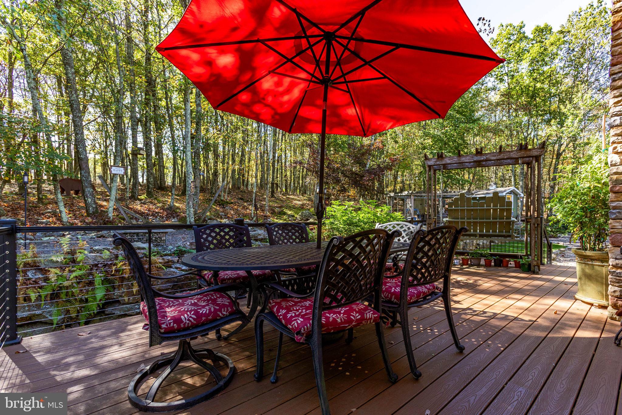 248 Country Club Drive Hazleton, PA 18202 - Photo 8 of 91 an outdoor space with furniture and umbrella