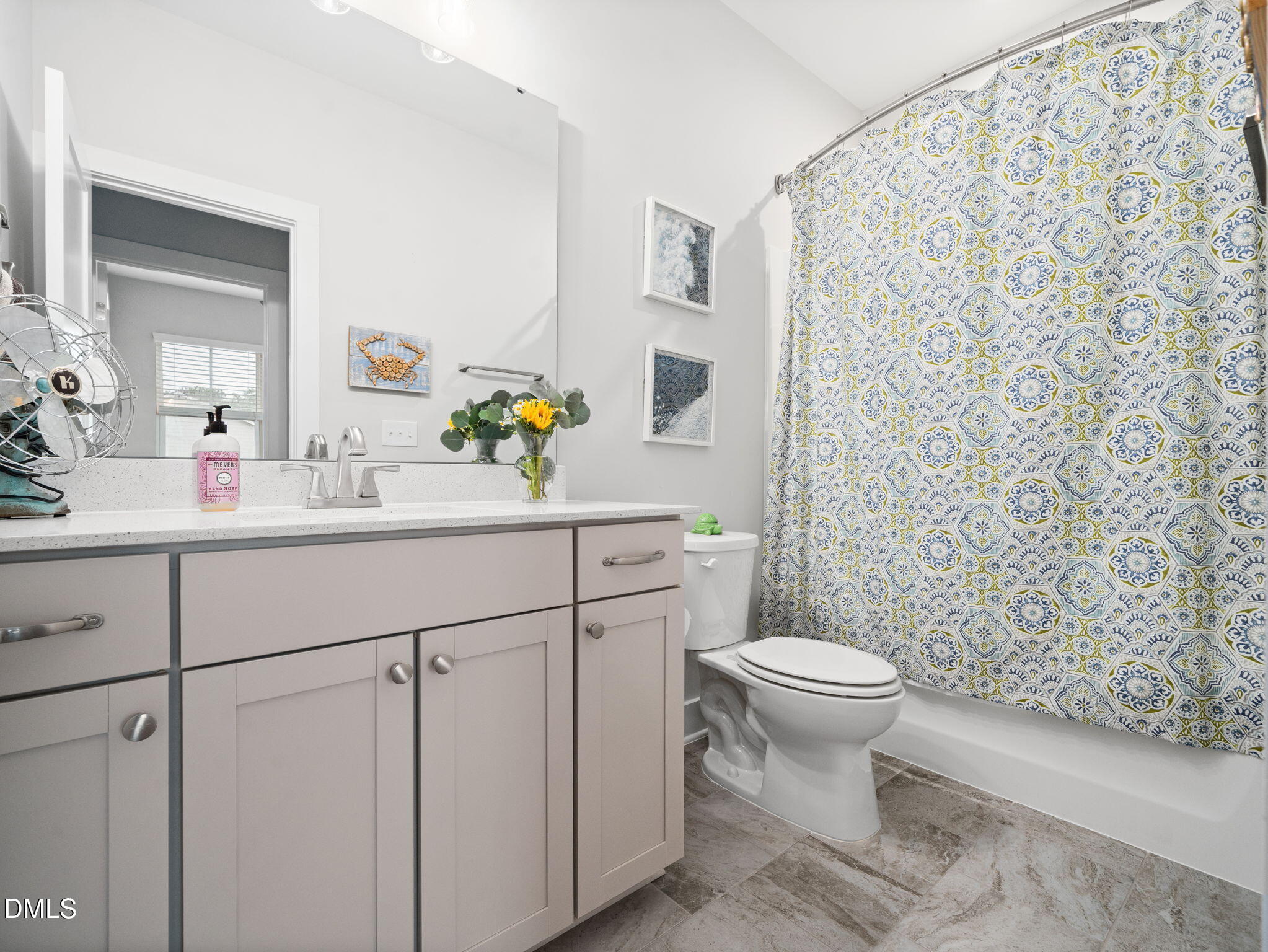 916 Waterside View Drive Raleigh, NC 27606 - Photo 21 of 22 a bathroom with a sink toilet and a mirror