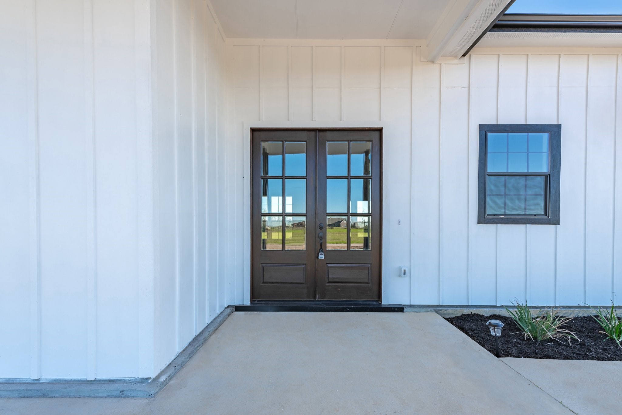 519 Chuckwagon Trail Angleton, TX 77515 - Photo 4 of 34 a view of an entryway with wooden floor and cabinet