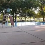 a view of a park with large trees