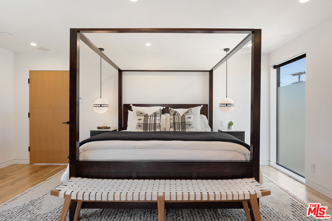 2624 Naples Avenue Venice, CA 90291 - Photo 23 of 38 a bedroom with a bed and window