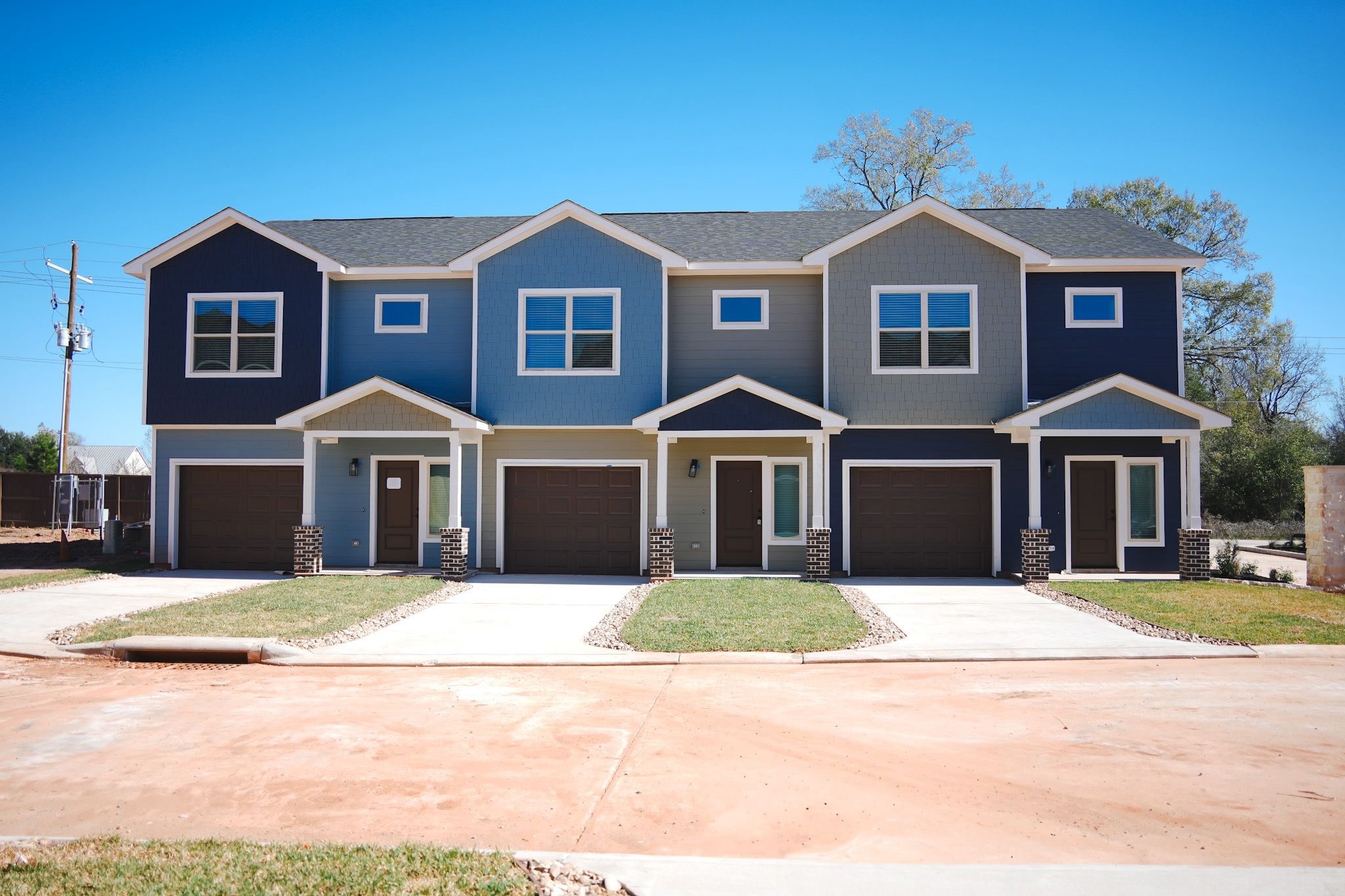 a front view of a house with yard