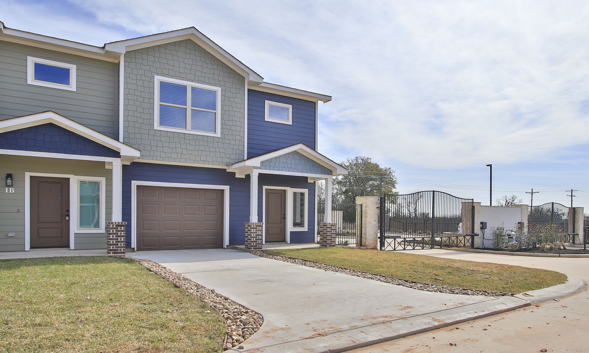 14010 Longstreet Road, Unit 4 Willis, TX 77318 - Photo 3 of 42 a front view of a house with a yard