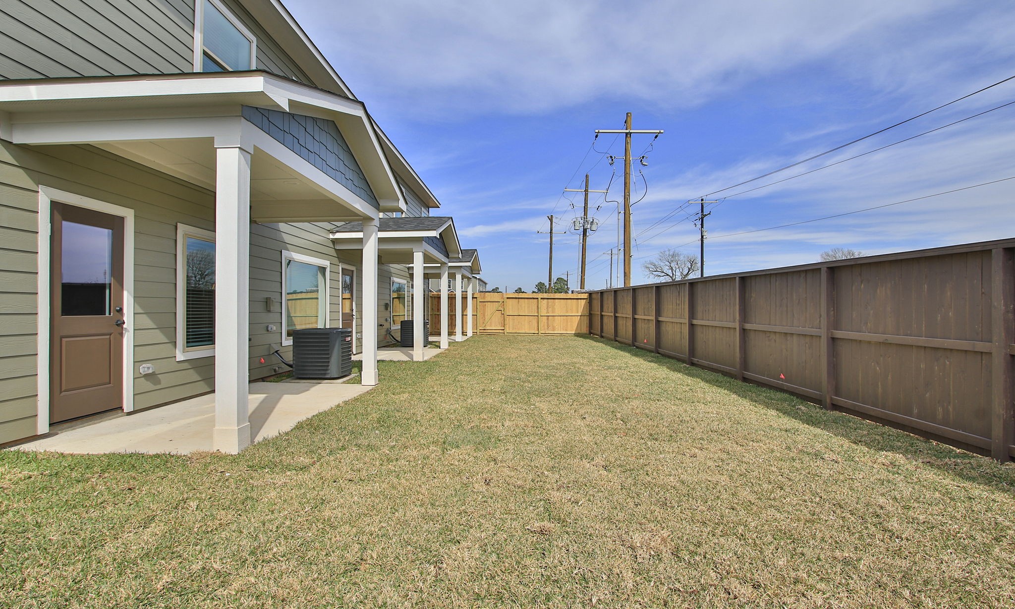 14010 Longstreet Road, Unit 4 Willis, TX 77318 - Photo 35 of 42 a view of a backyard