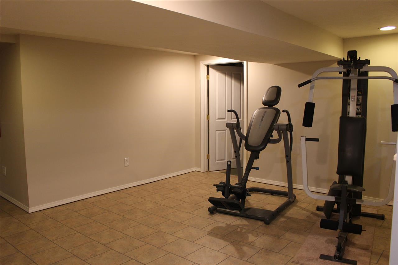 4212 Highcrest Road Rockford, IL 61107 - Photo 10 of 14 a view of a room with gym equipment