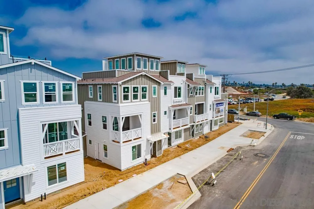 7064 Ponto Road Carlsbad, CA 92011 - Photo 5 of 28 a view of a building with many windows