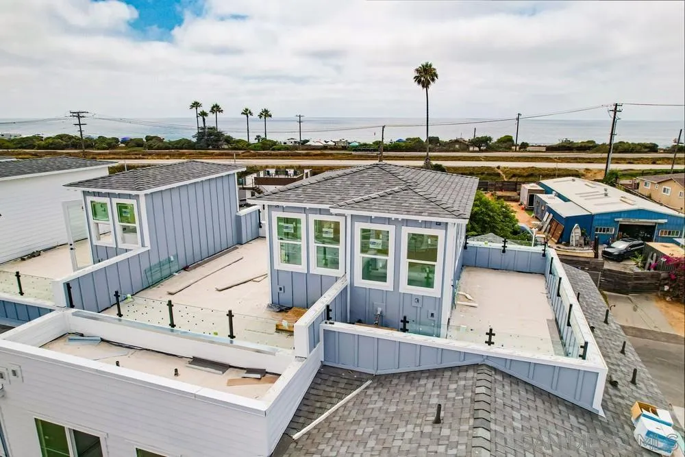 7064 Ponto Road Carlsbad, CA 92011 - Photo 9 of 28 a view of a patio with a table and chairs