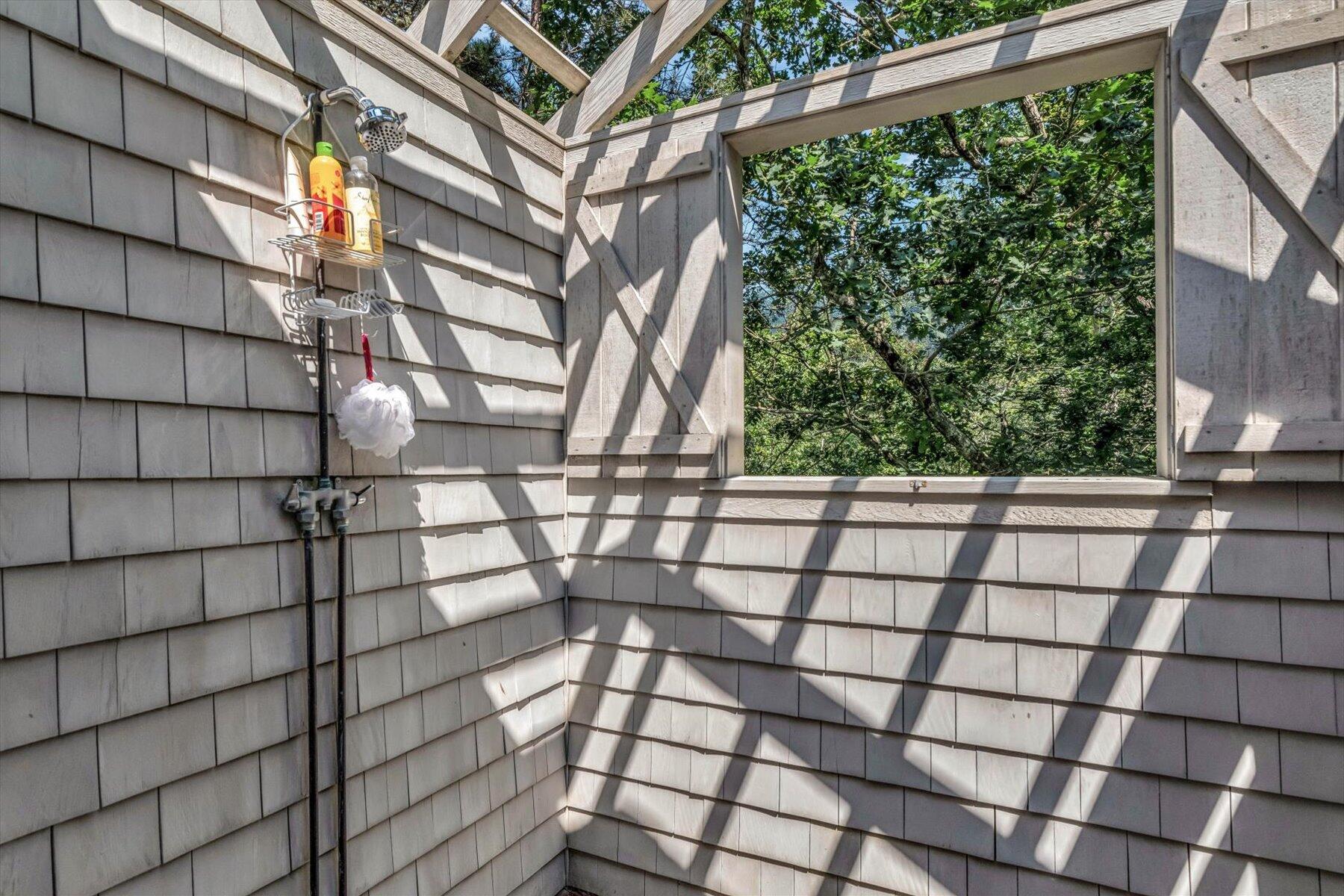 16 Tom's Hill Road Truro, MA 02666 - Photo 15 of 27 a view of entryway with a palm tree