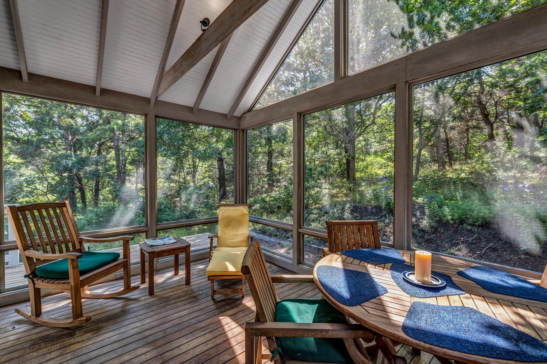 16 Tom's Hill Road Truro, MA 02666 - Photo 23 of 27 a patio with yard glass top table and chairs