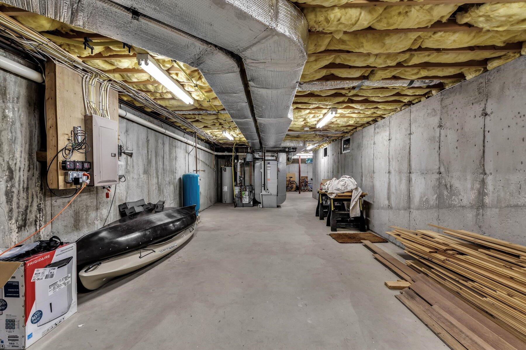 16 Tom's Hill Road Truro, MA 02666 - Photo 26 of 27 a view of a garage with parked cars