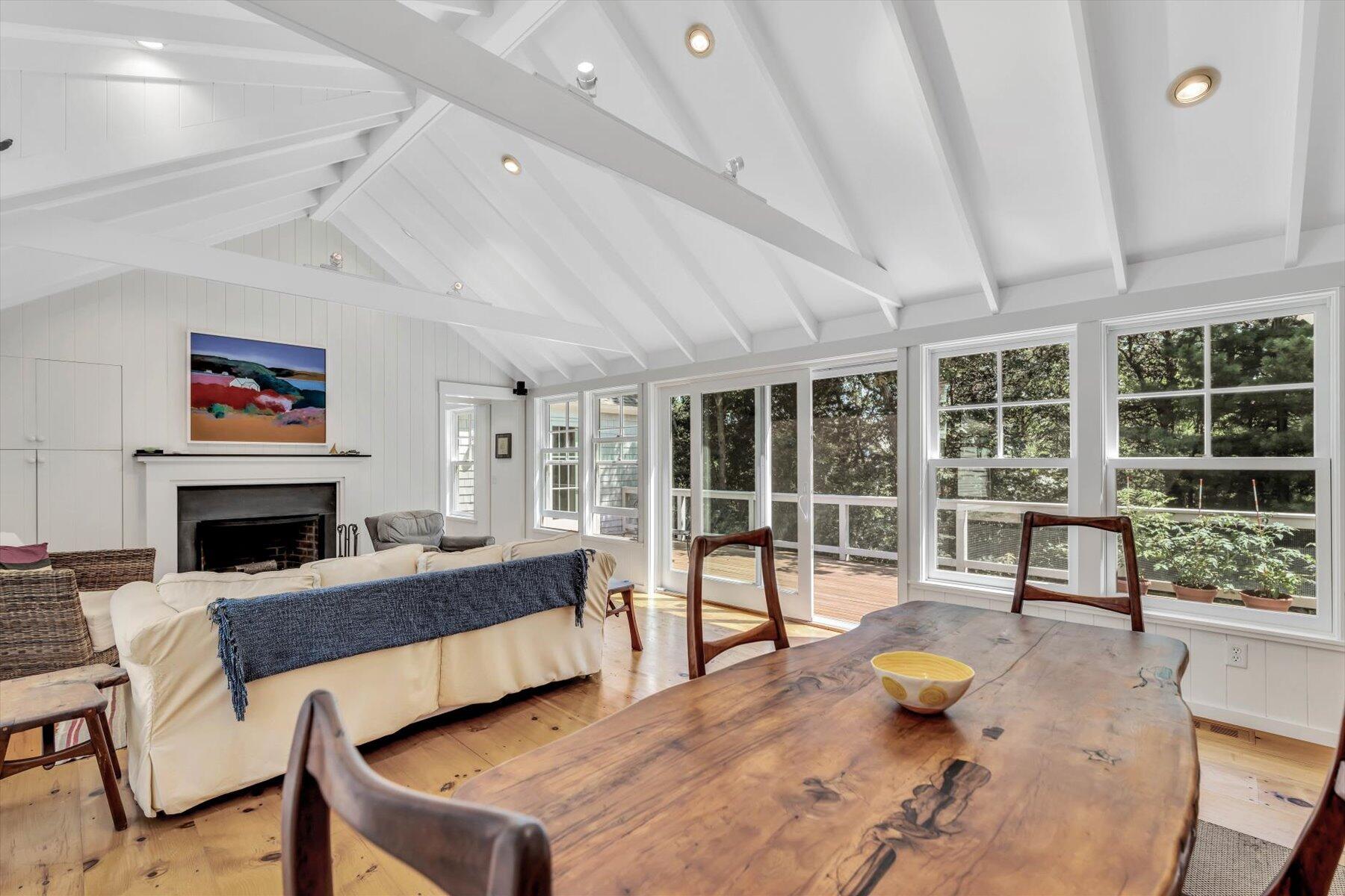16 Tom's Hill Road Truro, MA 02666 - Photo 3 of 27 a living room with furniture and a fireplace
