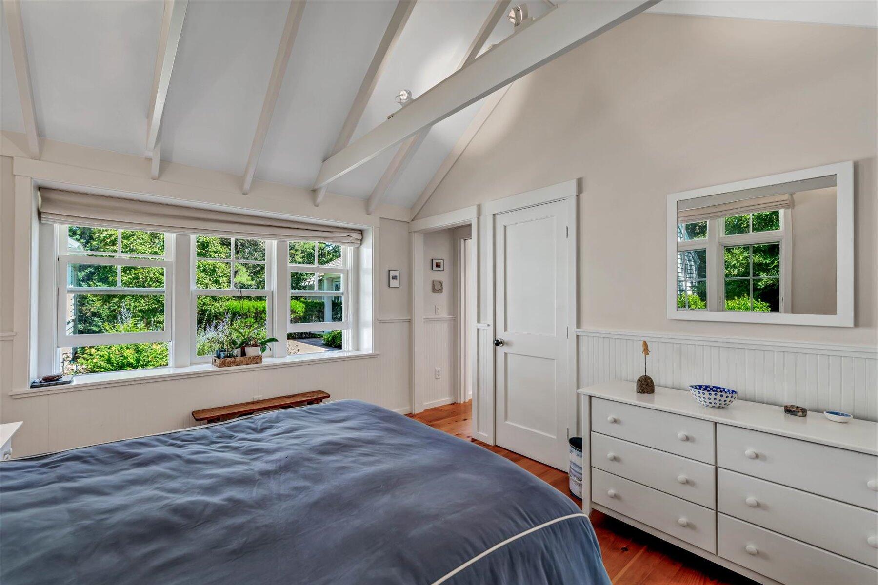 16 Tom's Hill Road Truro, MA 02666 - Photo 8 of 27 a bedroom with a bed and a window